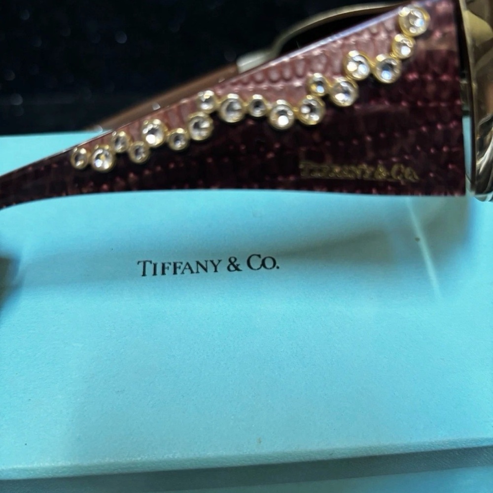 Tiffany & Co. Burgundy Sunglasses with Swarovski jewel Accents signed with case.